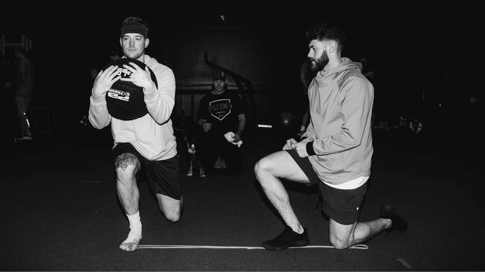 Push coaches working with a team